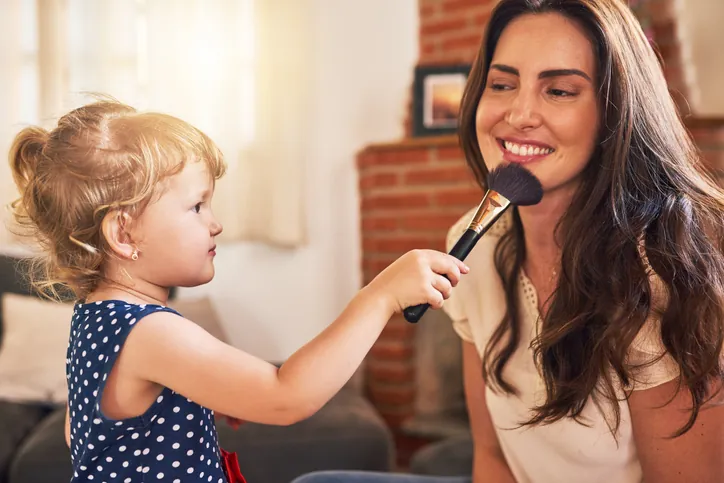 mommy-makeover-cost-maryland - Charm City Plastic Surgery - Charm City Plastic Surgery A mommy with her child before she had her mommy makeover done