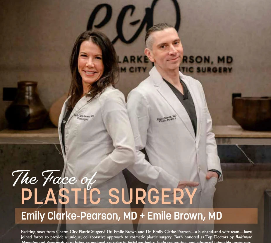 Two plastic surgeons in white coats stand back-to-back and smile in a clinic lobby; overlay text reads 'The Face of Plastic Surgery'.